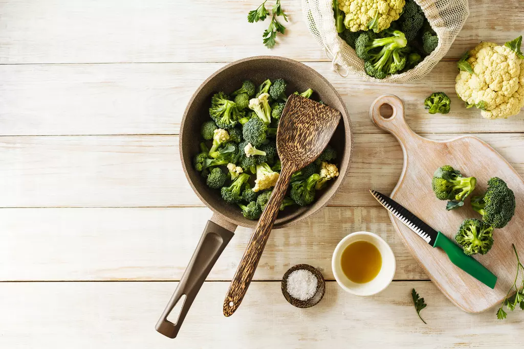 Fresh broccoli and cauliflower in a frying pan